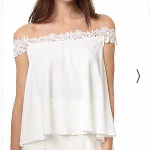 Rime Arodaky Carla off the shoulder lace trimmed crepe top